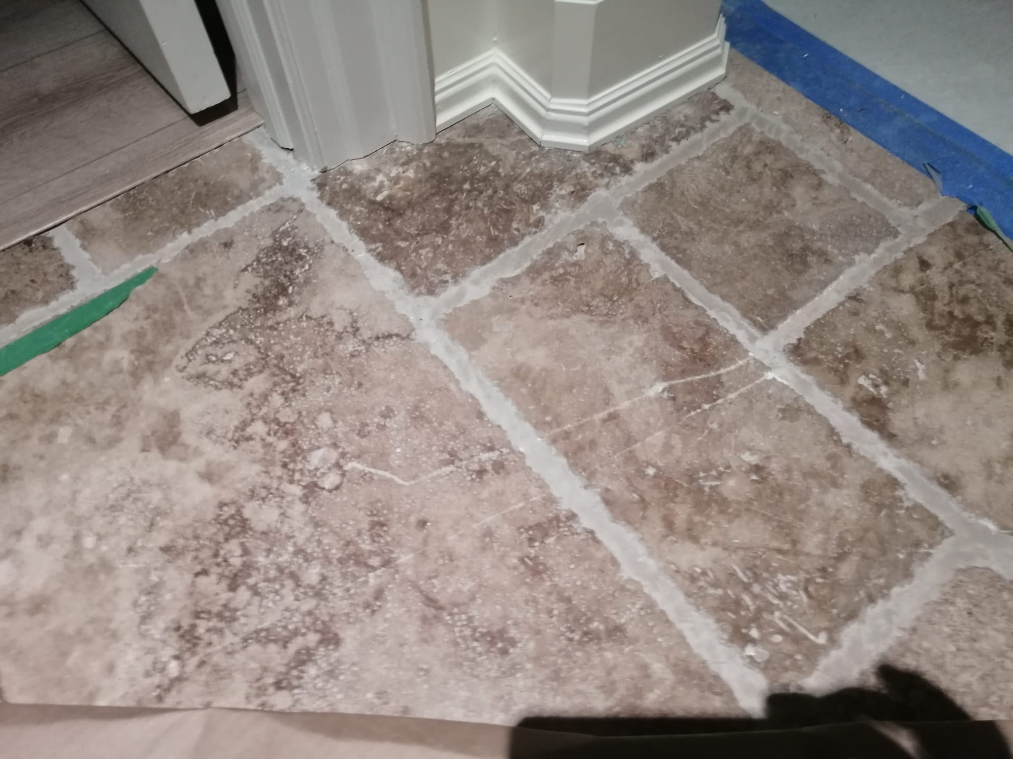 Tile floor before cleaning